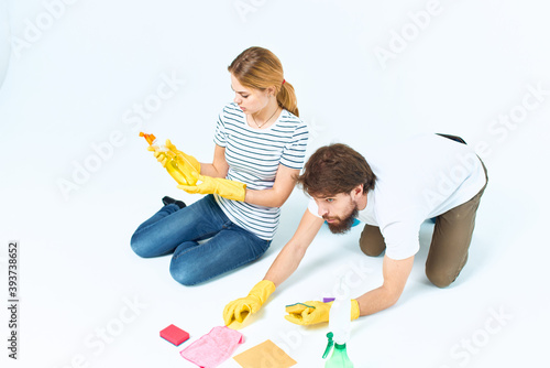 Man and woman detergent lifestyle cleaning teamwork