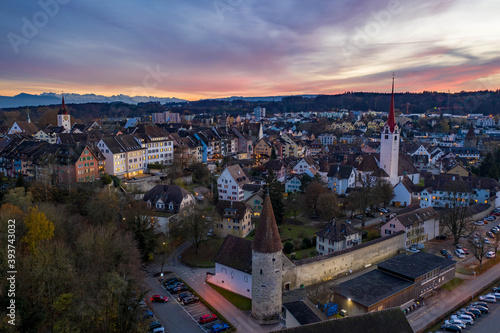 sunset over a medieval beautiful town  photo