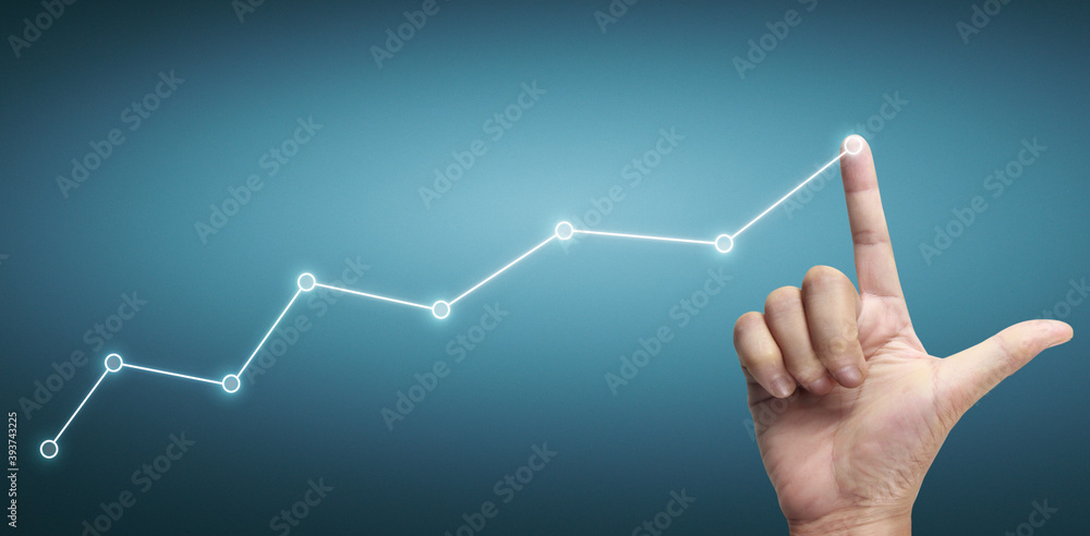Hand touching a graphs of financial indicator accounting market economy analysis chart Hand touching a graphs of financial indicator accounting market economy analysis chart
