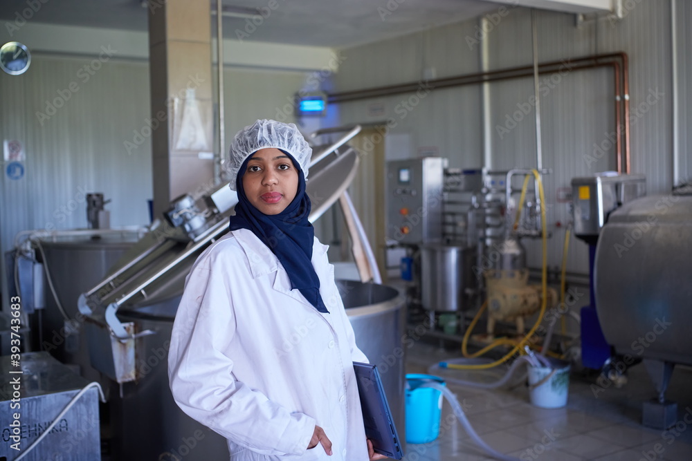 African black muslim business woman in local cheese production company