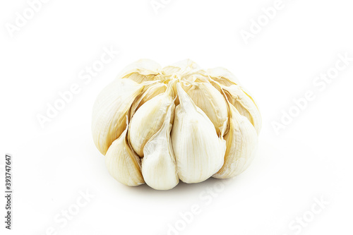 Closeup of garlic isolated on white background with clipping path, side view