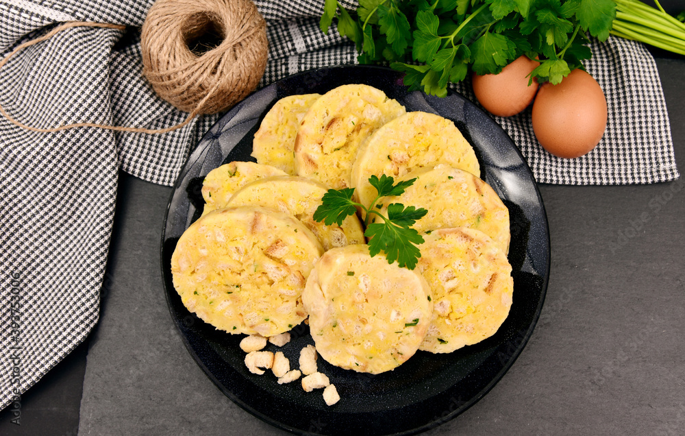 Carlsbad bread dumplings (German name is Serviettenknödel)..European menu.