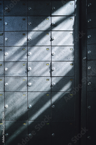 Close-up of mailboxes in an apartment building.