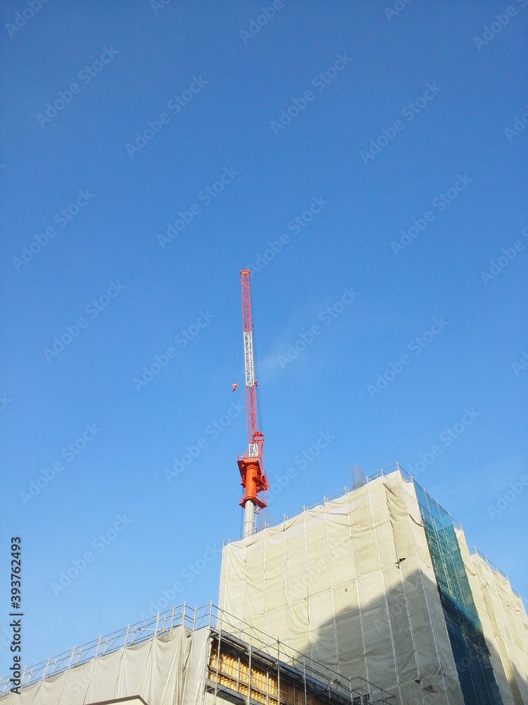 Obraz premium 建築,建物,ビル,重機,クレーン,都市,開発,工事,青空,Japan,city,building,architecture,development,tower