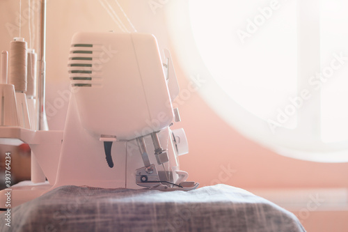 Close-up of sewing machine in fashion design studio