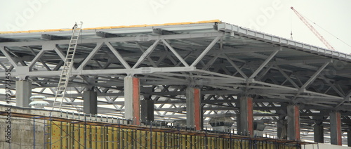 An old steel metal farm. structure of metal structure of frame-type industrial building. Lightweight metal frame construction.