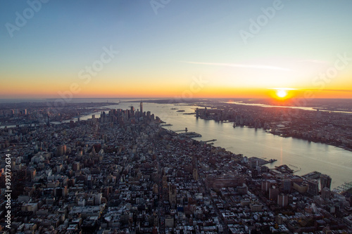 Sunset over Manhattan from the sky .