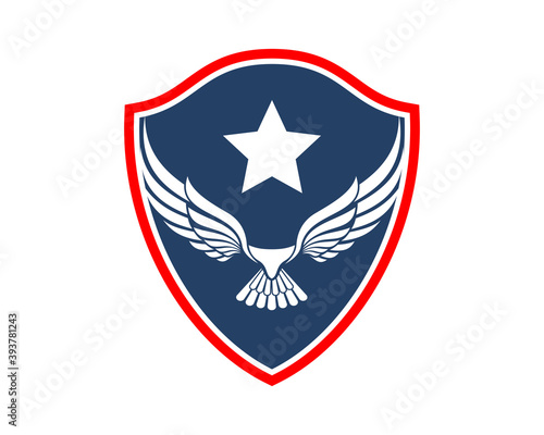Abstract flying eagle and star inside the shield