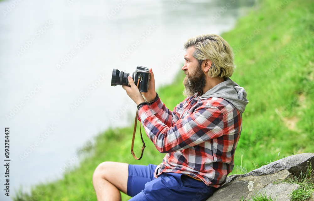 SLR camera. hipster man with beard use professional camera. photographer hold retro camera. journalist is my career. reporter make photo. vintage camera. capture these memories