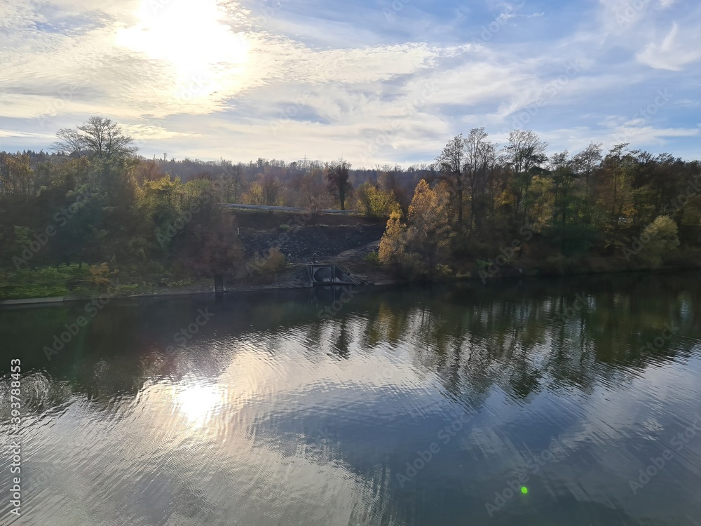 autumn panorama during sunset light with river and trees near Esslingen, Germany