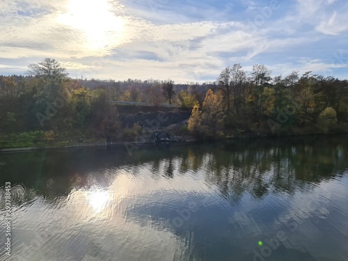 Obraz na płótnie autumn panorama during sunset light with river and trees near Esslingen, Germany w salonie