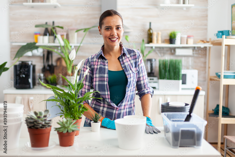 Woman planting decorative flowers for home using feritle soil. Decorative, plants, growing, lifestyle, design, botanica, dirt, domestic, growh, leaf, hobby, seeding, care, happy, green, natural, Woman planting decorative flowers for home using feritle soil. Decorative, plants, growing, lifestyle, design, botanica, dirt, domestic, growh, leaf, hobby, seeding, care, happy, green, natural,