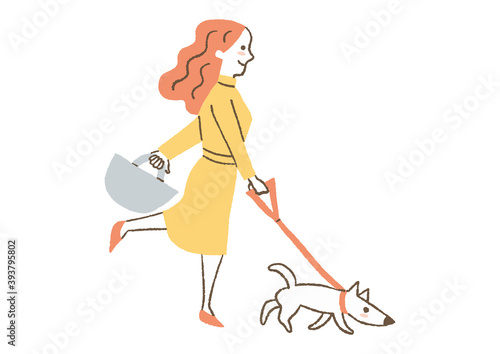 犬の散歩をする女性