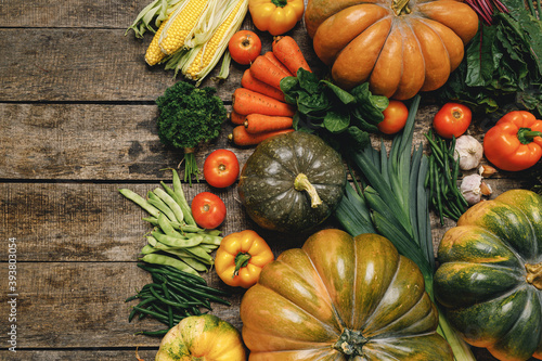 Beautiful arrengament of autumn vegetables on wooden table