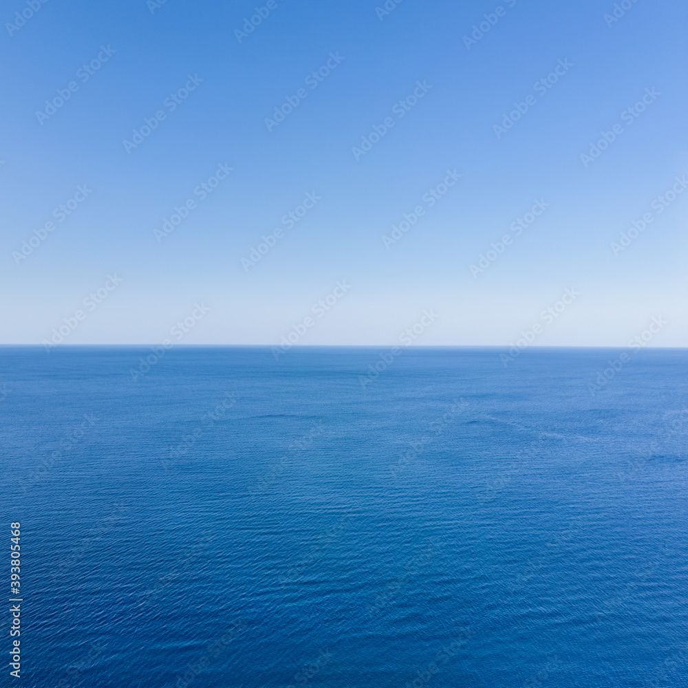 Top view aerial photo from flying drone of an amazingly beautiful sea landscape, blue water, rocky coast line. Barents Sea. Autumn in tundra, bright sunny day, vivid colors Top view aerial photo from flying drone of an amazingly beautiful sea landscape, blue water, rocky coast line. Barents Sea. Autumn in tundra, bright sunny day, vivid colors
