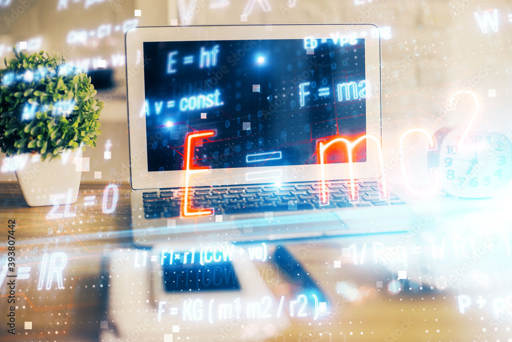 Desktop computer background and formula hologram writing. Double exposure. Education concept. Desktop computer background and formula hologram writing. Double exposure. Education concept.