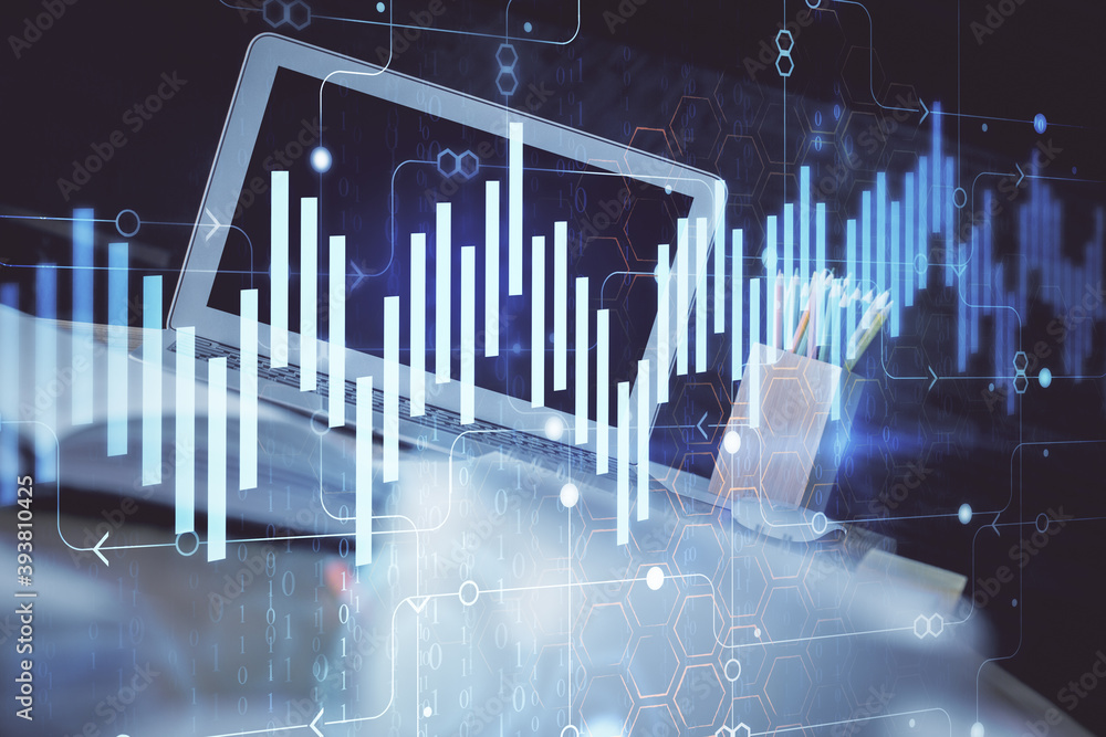 Stock market graph on background with desk and personal computer. Double exposure. Concept of financial analysis. Stock market graph on background with desk and personal computer. Double exposure. Concept of financial analysis.