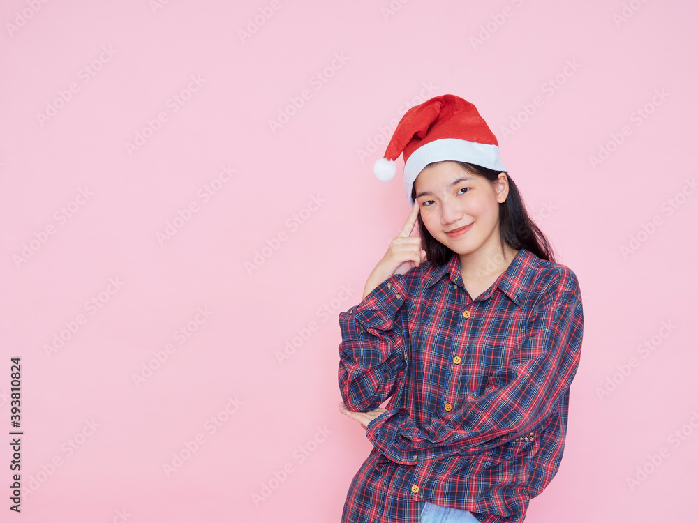 teenage girl wearing santa hat teenage girl wearing santa hat