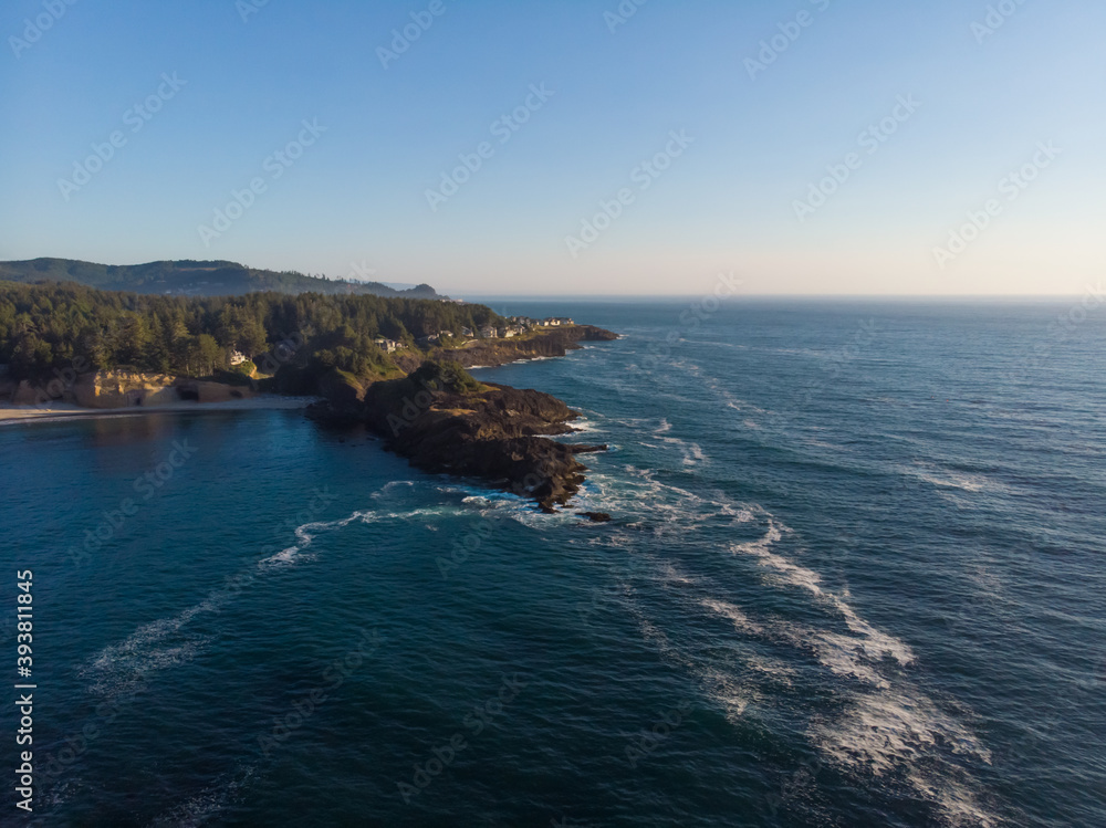 Aerial view of ocean with rocky coastline at warm sunny day. Amazing landscape. Discover the world concept. Travel. Wallpaper design. Aerial view of ocean with rocky coastline at warm sunny day. Amazing landscape. Discover the world concept. Travel. Wallpaper design.