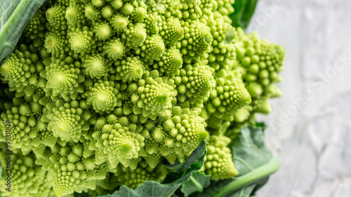 Romanesco broccoli close up. The fractal vegetable is known for it's connection to the fibonacci sequence and the golden ratio. Fun food for any practical scientists that loves mathematics