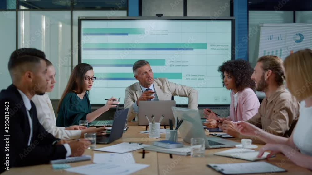 Financial director discussing strategy with managers. Team brainstorming ideas Financial director discussing strategy with managers. Team brainstorming ideas