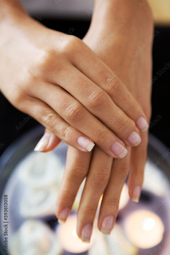 Close-up of woman receiving heat therapy on hand Close-up of woman receiving heat therapy on hand