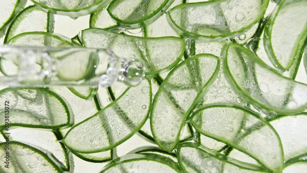 Cosmetic pipette with green serum Aloe vera, gel texture, hand sanitizer. Natural medical plant. Organic cosmetics, alternative medicine. . High quality 4k footage Cosmetic pipette with green serum Aloe vera, gel texture, hand sanitizer. Natural medical plant. Organic cosmetics, alternative medicine. . High quality 4k footage
