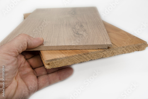 Comparison of laminate floor and wooden parquet floor