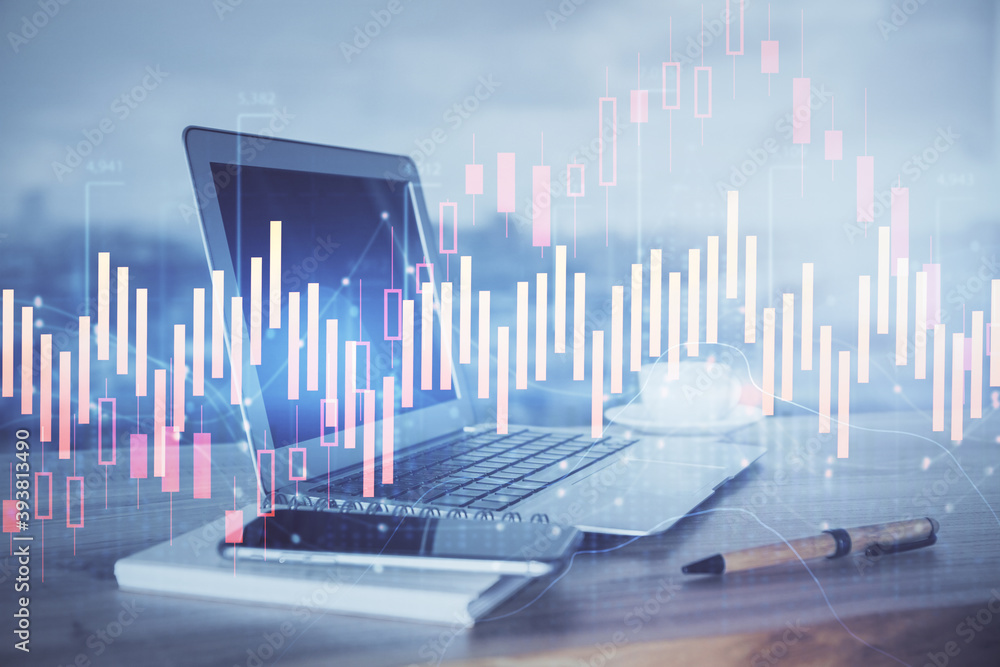 Forex Chart hologram on table with computer background. Multi exposure. Concept of financial markets. Forex Chart hologram on table with computer background. Multi exposure. Concept of financial markets.