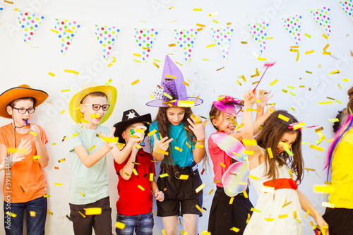 Kid's Birthday party with party horns and confetti