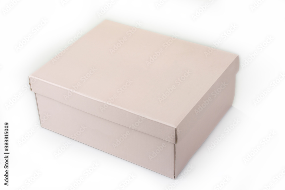 Empty pink paper box with a lid on a white