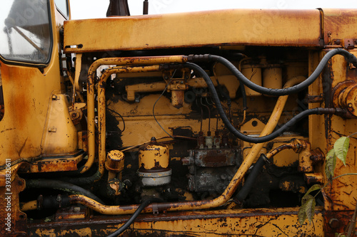 elements of the old yellow tractor