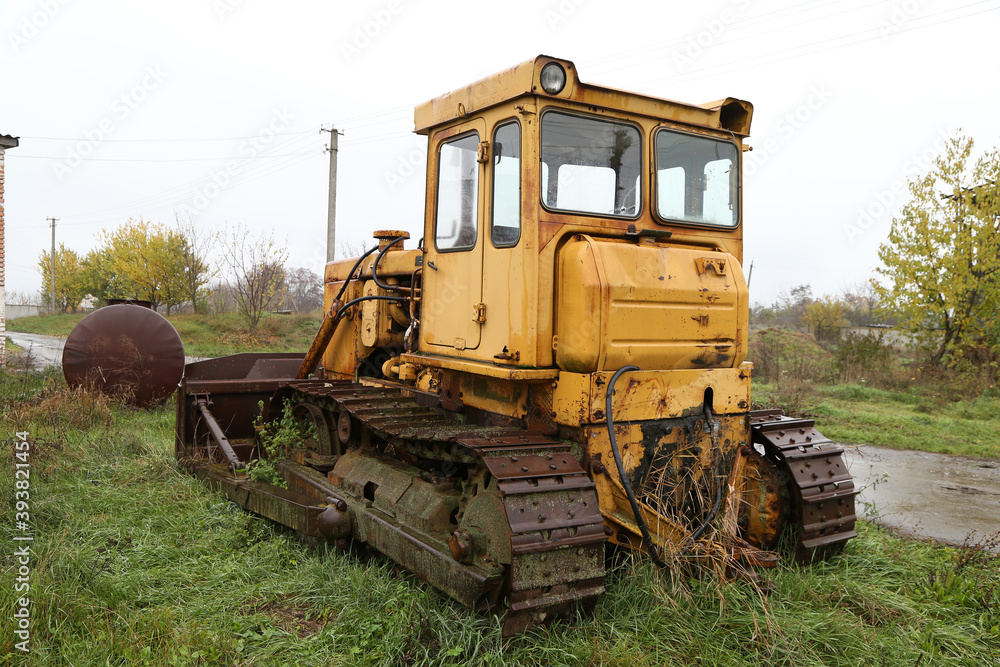 yellow crawler farm tractor