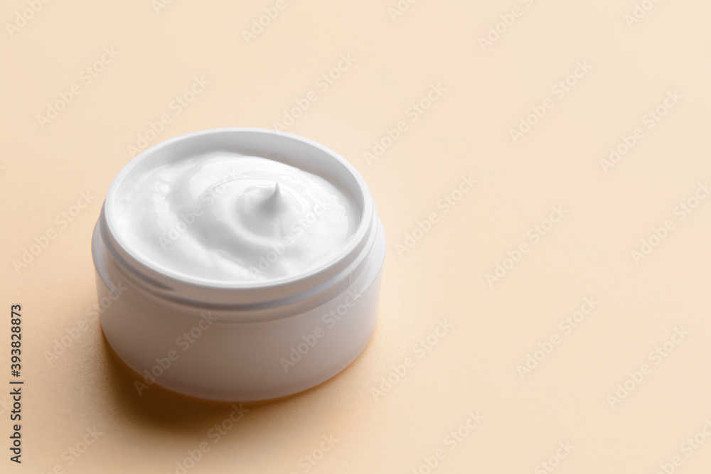 Cosmetic cream jar on color background Cosmetic cream jar on color background