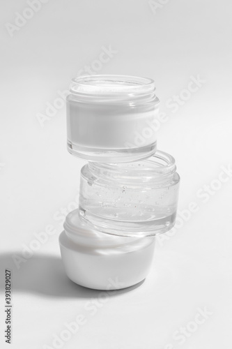 Fototapeta Naklejka Na Ścianę i Meble -  Cosmetic cream jars on white background