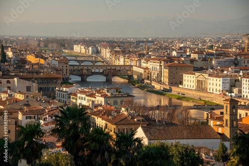 Florence at sunset with Arno river and Ponte Vecchio