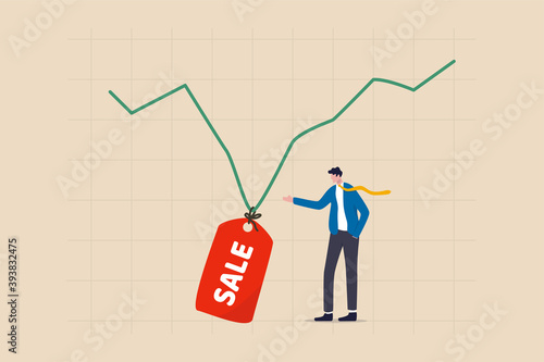 Stock market is on sale when market plunge in economic crisis, buy point to make profit in long run concept, businessman investor expertise pointing at lowest with sale price tag on stock market graph