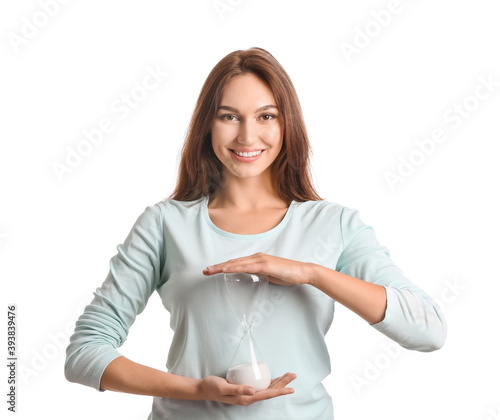 Young woman with hourglass ...