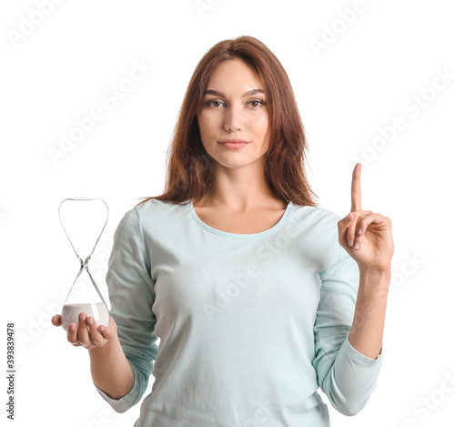 Young woman with hourglass ...
