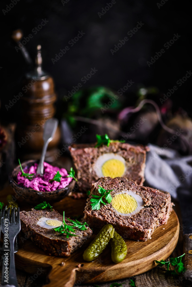 meatloaf with beets and eggs.selective focus..style rustic