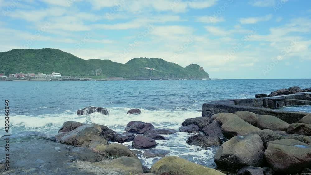 Video shoot at Long Dong Bay located in Gongliao District, Taipei, Taiwan. A place is famous for its geological Park, marinas, beaches, hiking trails, scuba diving, and rock climbing. Video shoot at Long Dong Bay located in Gongliao District, Taipei, Taiwan. A place is famous for its geological Park, marinas, beaches, hiking trails, scuba diving, and rock climbing.