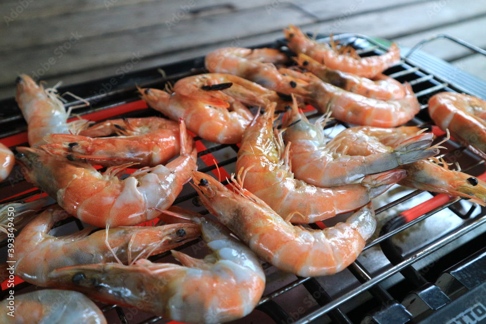 shrimp grilled bbq seafood on stove. shrimp grilled bbq seafood on stove.