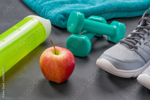 Fitness equipment on a dark background photo