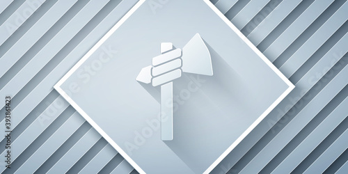 Paper cut Native american tomahawk axe icon isolated on grey background. Paper art style. Vector.