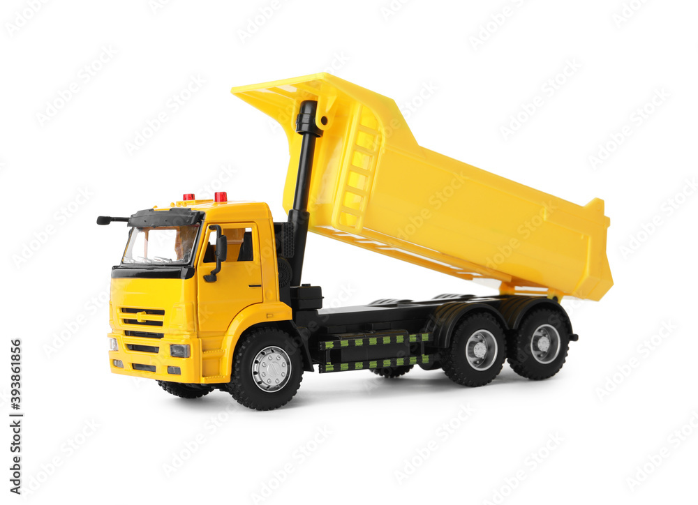 Yellow toy tipper truck isolated on white Yellow toy tipper truck isolated on white