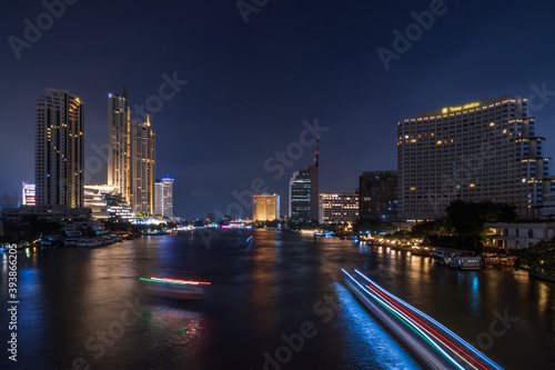Bangkok city center financial business district, waterfront cityscape and Chao Phraya River during  twilight © wirojsid