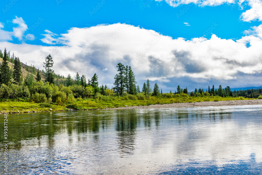 northern river flowing among the rocks on a summer day northern river flowing among the rocks on a summer day