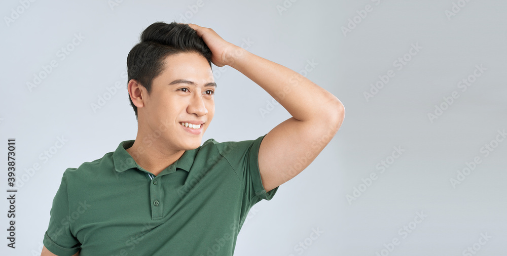 Man touching his hair. Isolated on white Man touching his hair. Isolated on white