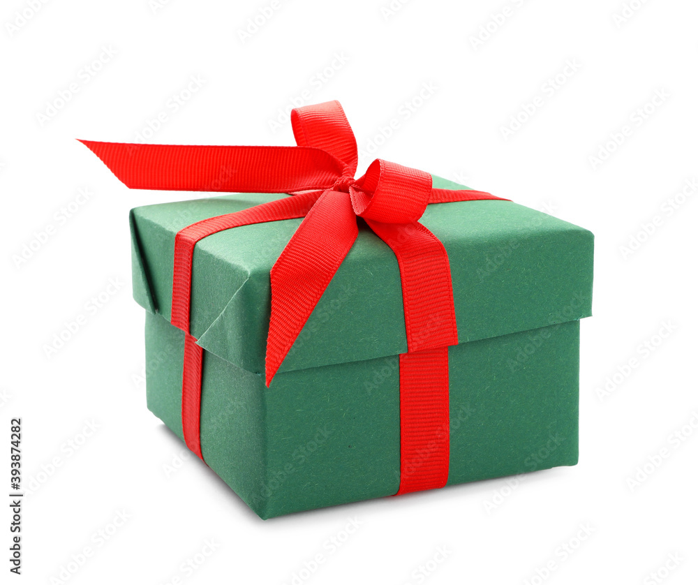 Fototapeta premium Christmas gift box decorated with red bow isolated on white