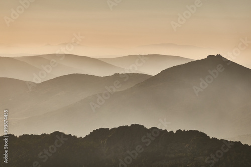 La Maliciosa, La Bola del Mundo, Navacerrada, La Pedriza, El Yelmo and the oak forests in autumn in the Sierra de Guadarrama National Park. Madrid's community. Spain photo